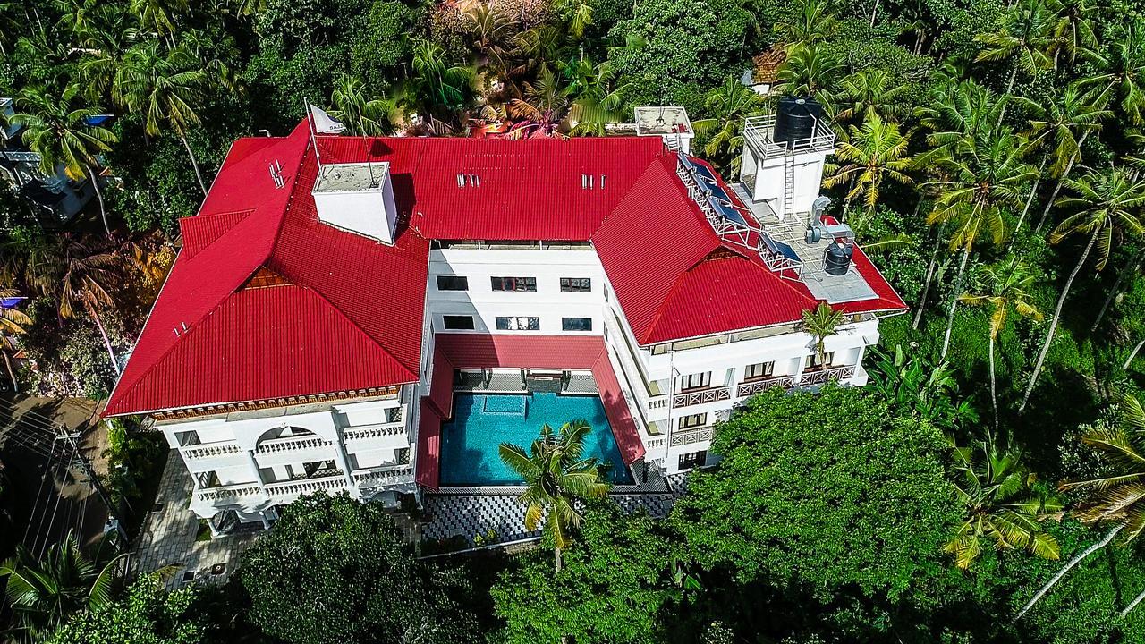 Hotel Sajjoys Varkala Esterno foto